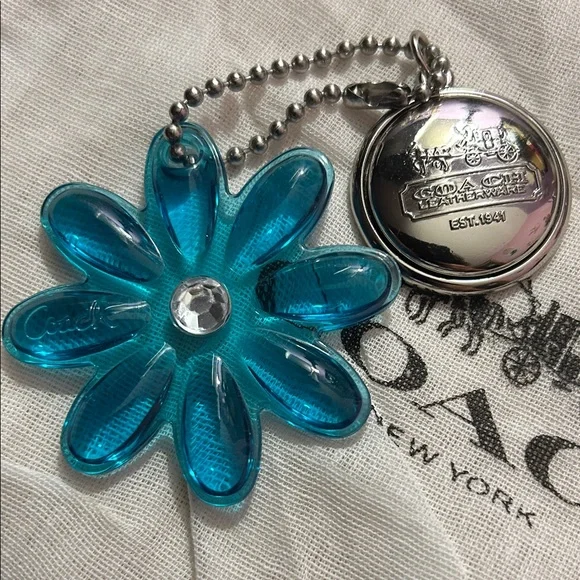Coach Teal Lucite Daisy Keychain with Silver Coach Medallion in EUC - Picture 1 of 5